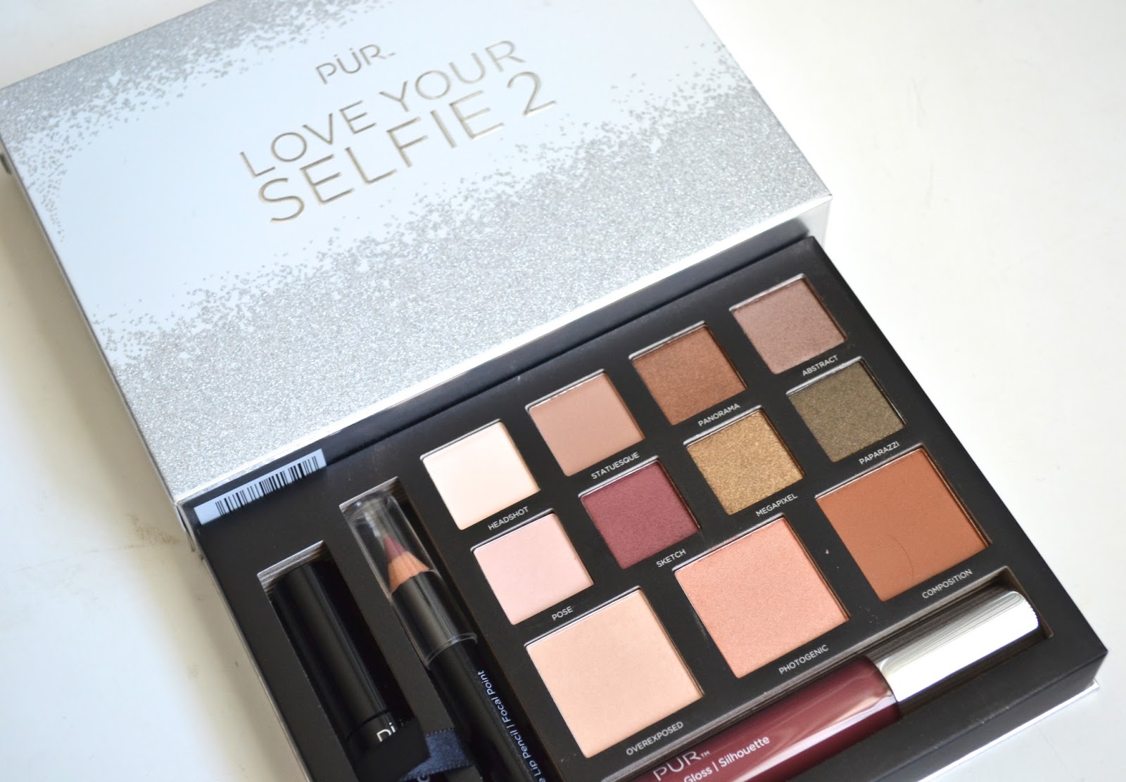 Love Your Selfie 2 "Day to NIght Collection" includes 8 eyeshadows in matte and shimmer textures, glow highlighter, matte bronzer, setting powder, creamy lip pencil, high-shine lip-plumping gloss and fully charged mascara.